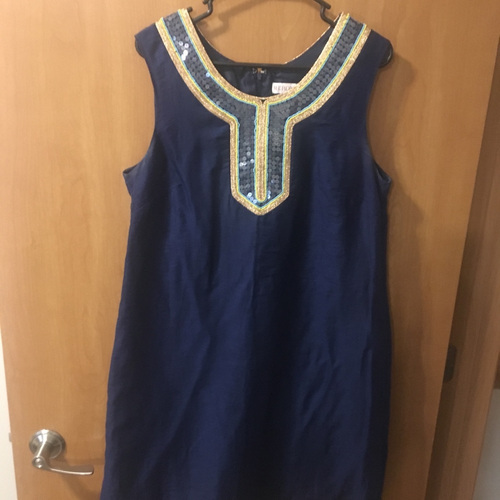 Sleeveless, mid dress.